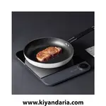 جاق برقی رو میزی Xiaomi مدل thin Induction Cooker مشکی در حال پخت 